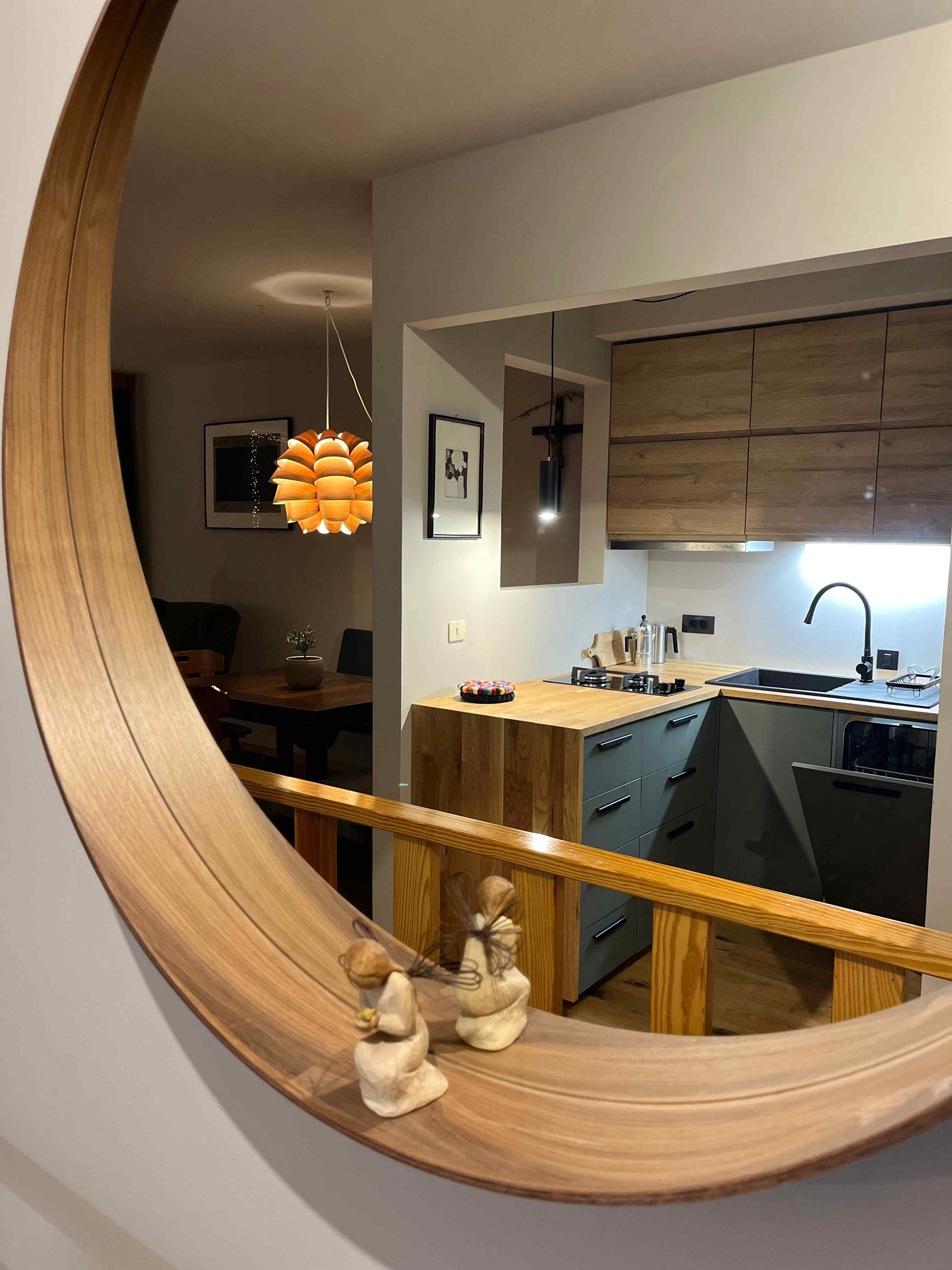 Fully equiped kitchen reflection in the mirror